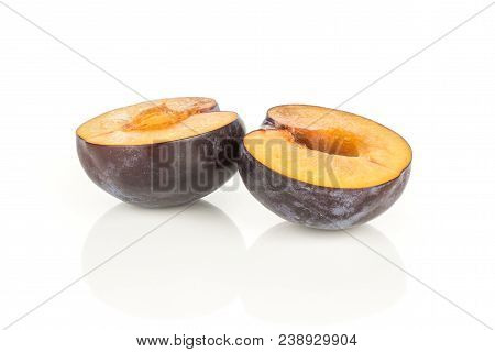 Red Blue Plums Two Section Halves Isolated On White Background