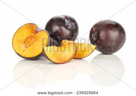 Red Blue Plums Set Two Whole One Half And Two Slices Isolated On White Background