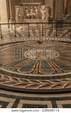 Paris, Northern France - July 12, 2017. View Of The Famous Foucault Pendulum Copper Ball Swinging In