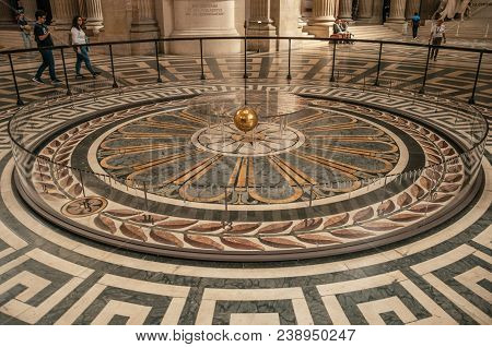 Paris, Northern France - July 12, 2017. View Of The Famous Foucault Pendulum Copper Ball Swinging In