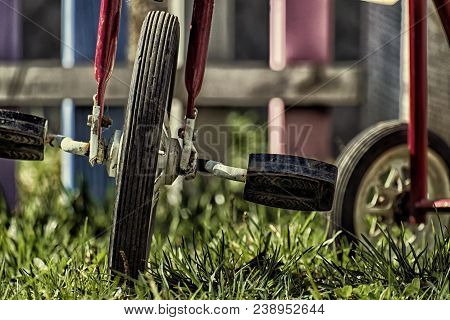 Front Wheel With Pedals. Part Of The Children's Three-wheeled Bicycle Of The Ussr 80S