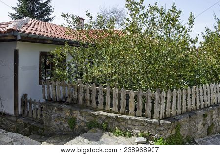 Blagoevgrad, Bulgaria - March 17, 2018: Ancient Residential District With House In The Wooden Fence 