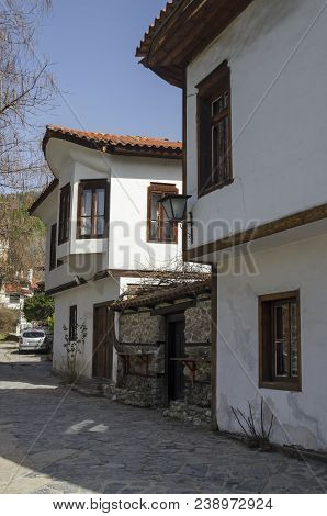 Blagoevgrad, Bulgaria - March 17, 2018: Ancient Residential District With Narrow Alley And Authentic