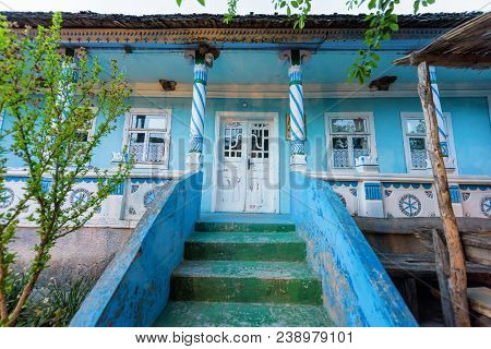 Traditional Rustic House Decorated With Wooden Ornaments