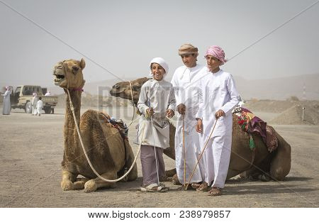 Ibri, Oman, 28th April 2018: Young Omani Man With His Camel Before A Race