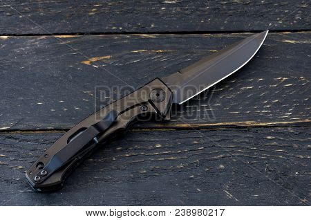 Knife With Titanium Handle. Knife With A Clip.