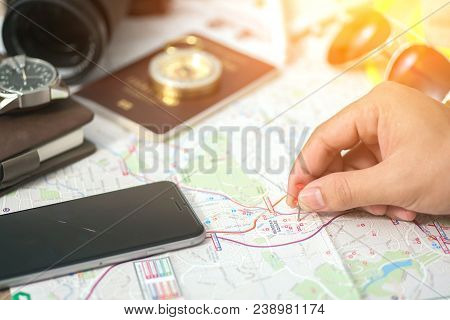 Pins Attached To Map, Showing Location Or Travel Destination . Retro Style Image. Selective Focus.