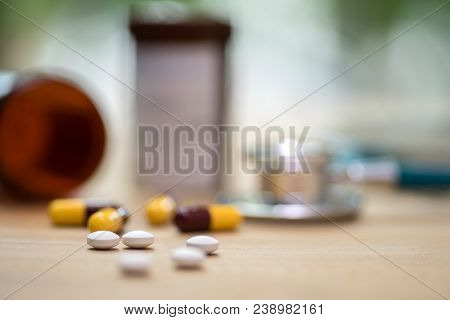 Medicine Pills Or Capsules In Hand, Palm Or Fingers Of A Doctor Or Nurse. Drug Prescription For Trea