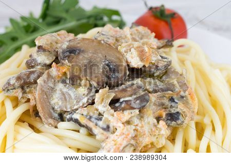 Fried Mushrooms In Sauce. Spaghetti And Vegetables.
