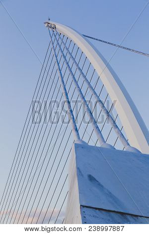 View Of Dublin's Famous Samuel Beckett Bridge Over The River Liffey At Blue Hour