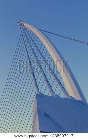 View Of Dublin's Famous Samuel Beckett Bridge Over The River Liffey At Blue Hour