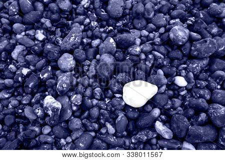 Closeup Of Natural Peeble Beach.beautiful Abstract Texture In Modern Blue Color. Mountain Closeup Wi