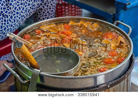 Pot Of Cooking Vietnamese Crab Paste Noodle Soup- Bun Rieu