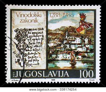 ZAGREB, CROATIA - JUNE 21, 2014: A stamp issued in Yugoslavia shows Vinodol Law Codex, circa 1988.