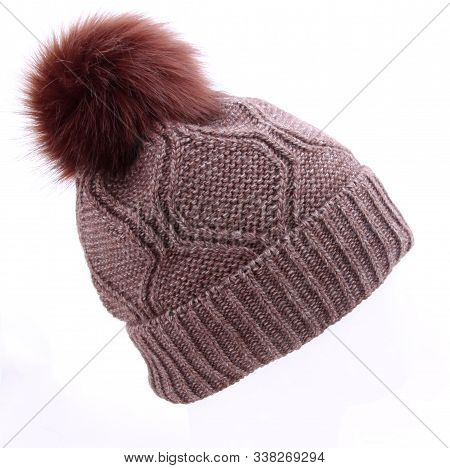 Brown Knitted Hat On A White Background