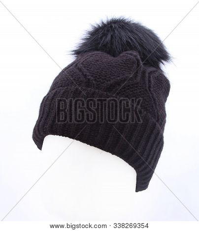 Knitted Hat Isolated On White Background .hat With Pompon Black .