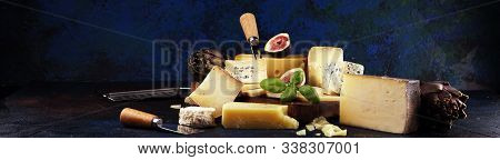 Different Sorts Of Cheese. Cheese Platter With Different Cheese And Spice