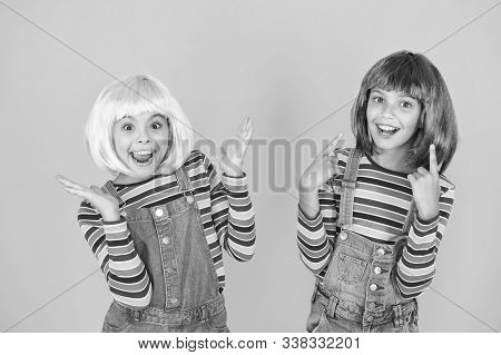 Happy Little Girls. Anime Fan. Cheerful Friends In Colorful Wigs. Anime Convention. Anime Cosplay Pa