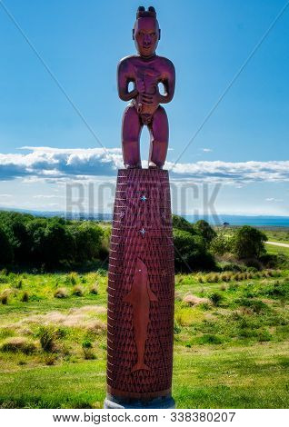 Napier, Hawkes Bay / New Zealand April 19, 2016  Maori Traditional Wooden Carved Totem Pole Represen