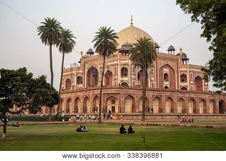 New Delhi, India - December 7, 2019: Crowds Of Tourists Enjoy Exploring The Humayans Tomb Ancient Co