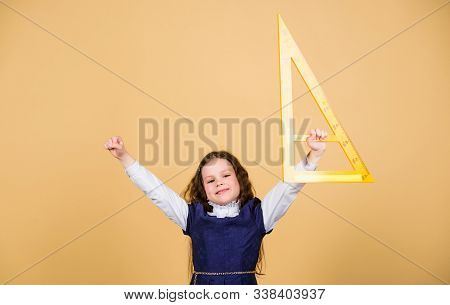 Kid School Uniform Hold Ruler. School Education Concept. Learn Mathematics. Theorems And Axioms. Sma