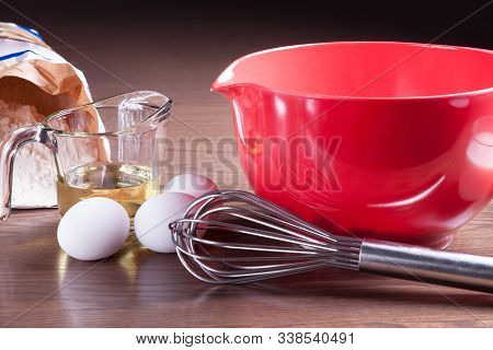 Closeup On Ingredients And Tools To Cook A Homemade Cake From Scratch