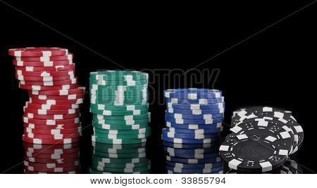 Casino chips isolated on black