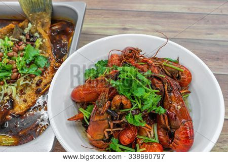 Chongqing Sichuan Spicy Dried Chilli Small Lobsters, And Chongqing Grilled Dish. Food Photography At