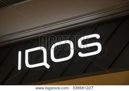 Osaka, Japan- 03 Dec, 2019: Iqos Sign Osaka Kansai Airport (kix). Iqos Is A Tobacco Heating System