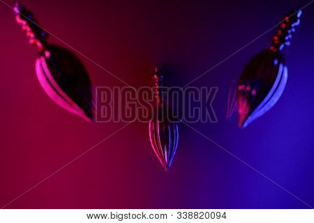 Butt Plug On Neon Background. Sex Toys For Ass. Abstract Light Blue And Pink Neon Background Texture