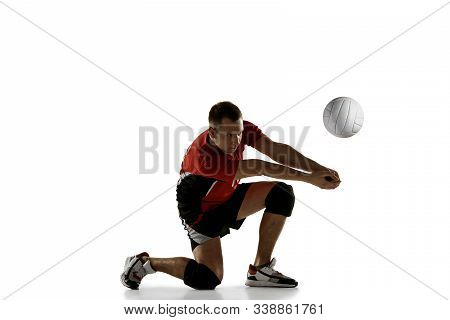 Young Caucasian Volleyball Player Placticing Isolated On White Background. Male Sportsman Training W