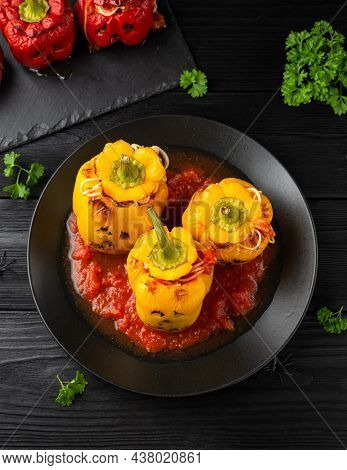 Jack O Lanterns Stuffed Yellow Pepper For Halloween.