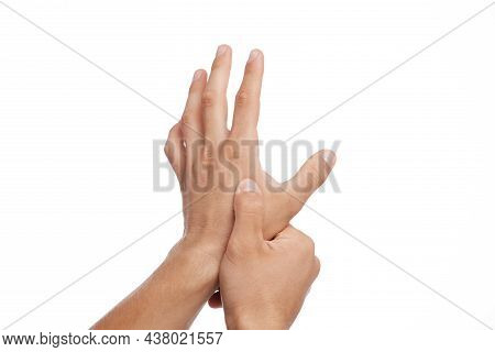 Unrecognizable Young Caucasian Man Suffer From Pain In Arm And Pressing Hand To Sore Spot