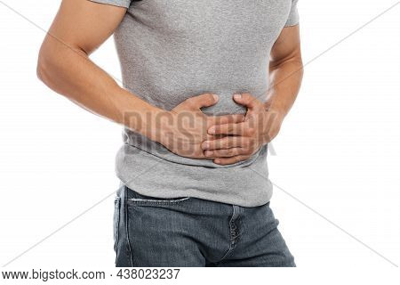 Cropped Millennial European Male Suffering From Abdominal Pain And Pressing His Hands To Sore Spot