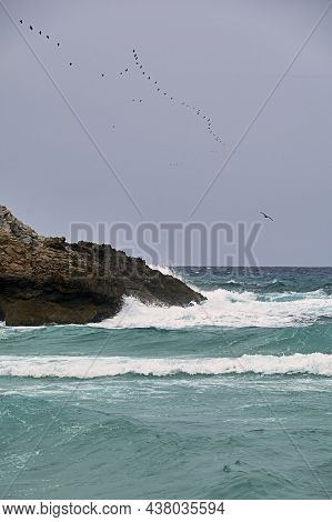 Shore Rocks Battered By Waves. Mediterranean Sea