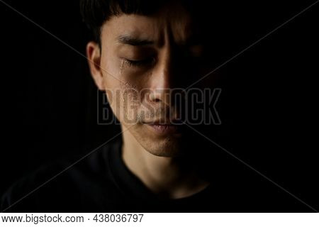 Image Of A Man Who Sheds Tears