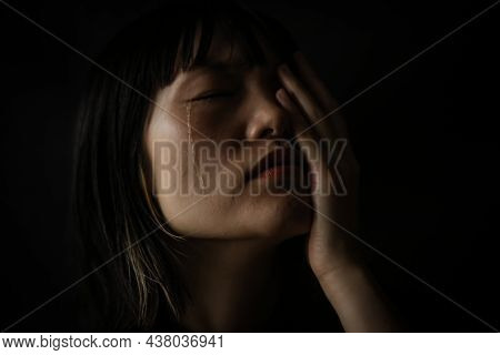 Image Of A Woman Who Sheds Tears