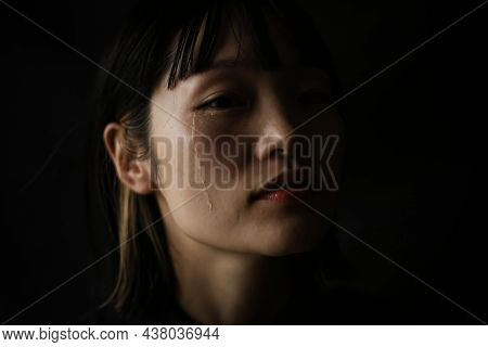 Image Of A Woman Who Sheds Tears