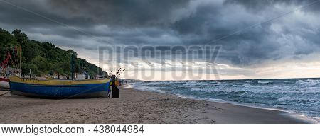 Storm Sunset Over The Baltic Sea In Rewal, Poland. Widescreen (panoramic) Banner Of Vacations Landsc