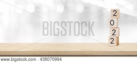 Happy New Year 2022 On Wood Cube Block And Blur Abstract Bokeh Light Background With Copy Space For 