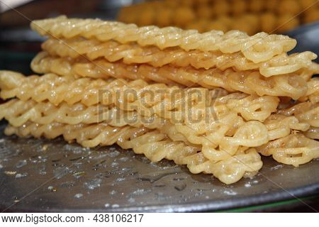 Red Color Jalebi Ready For Sell In Local Market.jalebi, Also Known As Jilapi, Jilebi, Jilipi, Zulbia