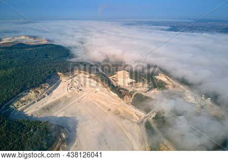 Aerial View Of Open Pit Mining Site Of Limestone Materials Extraction For Construction Industry With