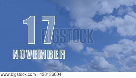 November 17. 17-th Day Of The Month, Calendar Date.white Numbers Against A Blue Sky With Clouds. Cop