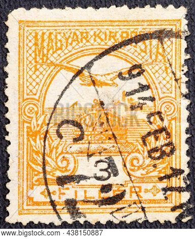 A Postage Stamp Printed In Hungary Depicts The Mythical Bird Turul Flying Over The Crown Of St. Step