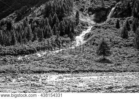 Wild Alpine Waterfall On Schlatenbach Mountain Stream. Gschloesstal Valley, Hohe Tauern National Par