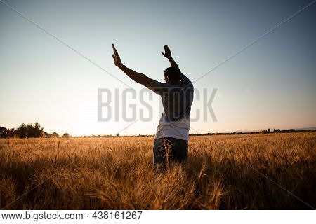 Farmer In The Middle Of The Field