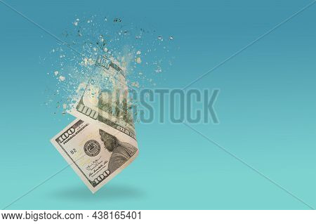 Inflation, Hyperinflation, Dollar Stagflation. One Hundred Dollar Bill Sprayed On A Blue Background.