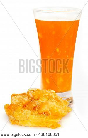 Medicinal Bael Fruit With Juice In A Glass Over White Background