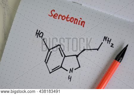 Serotonin Molecule Write On The Paperwork. Structural Chemical Formula. Education Concept