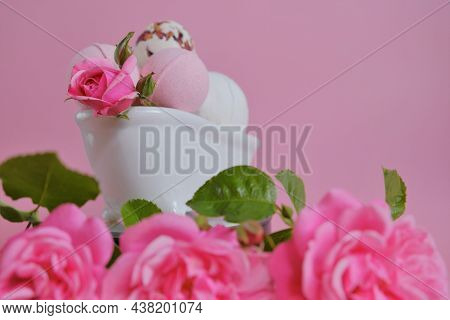 Bath Bombs With Rose Extract In A Bath And Pink Roses On A Pink Background.pink Bath Bombs And Pink 